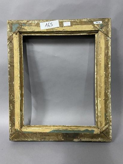 null Sculpted and gilded lindenwood frame decorated with shells and openwork foliage

Louis...