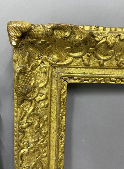 null Carved and gilded oak frame with Bérain decoration

Louis XIV period

64 x 52.5...