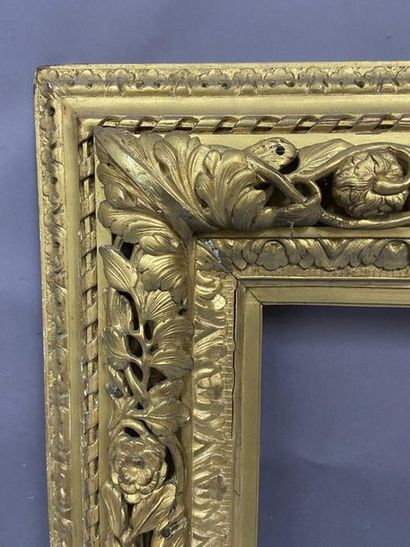 null Carved and gilded wood frame with openwork decoration of foliated and flowery...