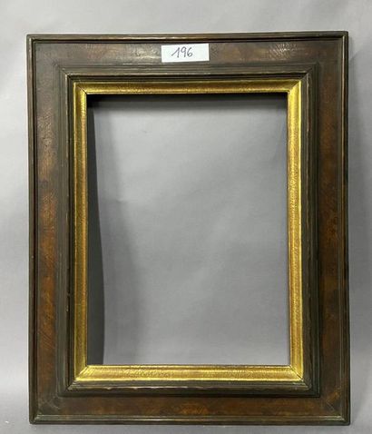 null Moulded wooden frame with a patina and gilded rabbets with an inverted profile...