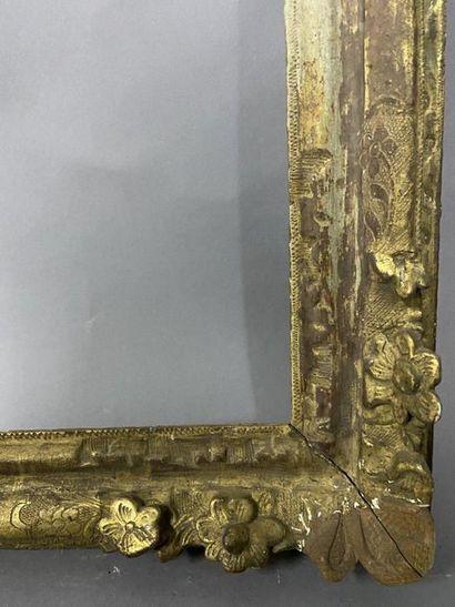 null Carved oak frame, formerly gilded, with corner decoration of flowers and fleur-de-lys

Louis...