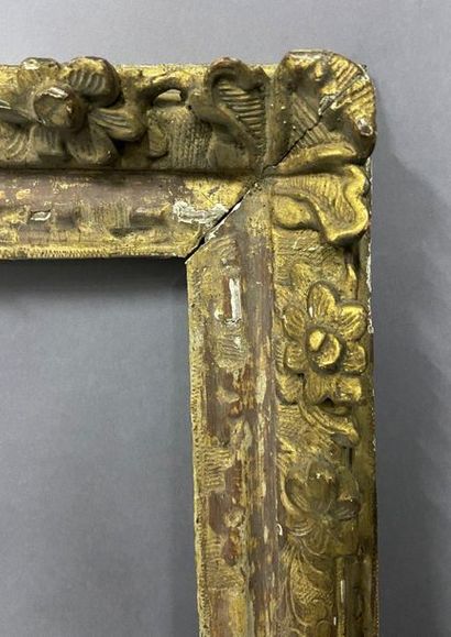 null Carved oak frame, formerly gilded, with corner decoration of flowers and fleur-de-lys

Louis...