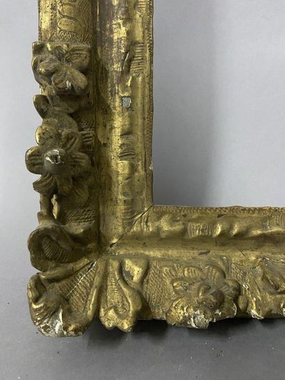 null Carved oak frame, formerly gilded, with corner decoration of flowers and fleur-de-lys

Louis...