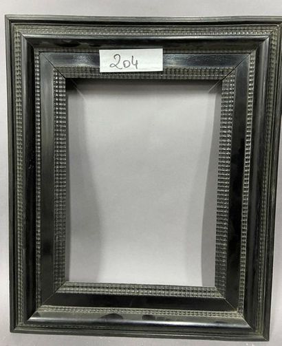 null Blackened moulded wooden frame with guilloché decoration

Netherlands style...