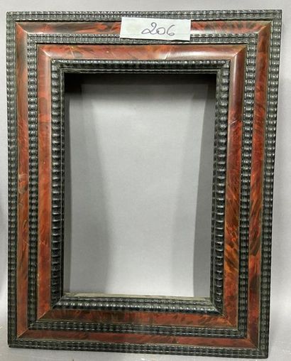 null Wooden frame with fake tortoiseshell veneer and blackened chopsticks,

Dutch...