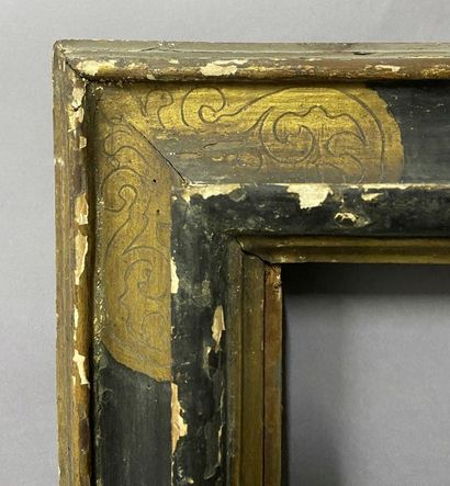 null Gold and blackened moulded wooden frame with upside down profile

Italy or Espgane...