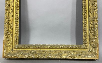null Carved and gilded wooden frame with mantling decoration

England, 18th century

39...