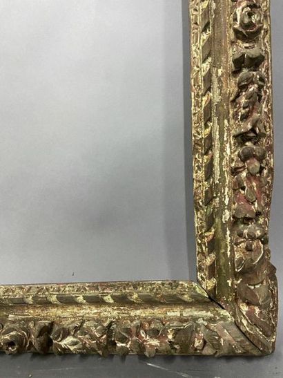 null Carved and formerly gilded oak frame decorated with a frieze of laurel leaves

Louis...