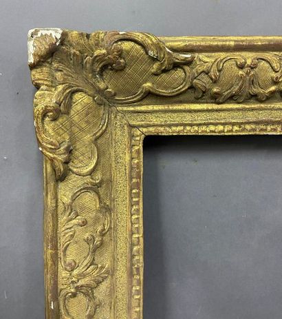 null Carved and gilded oak frame with Bérain decoration

Louis XIV period

39 x 55...