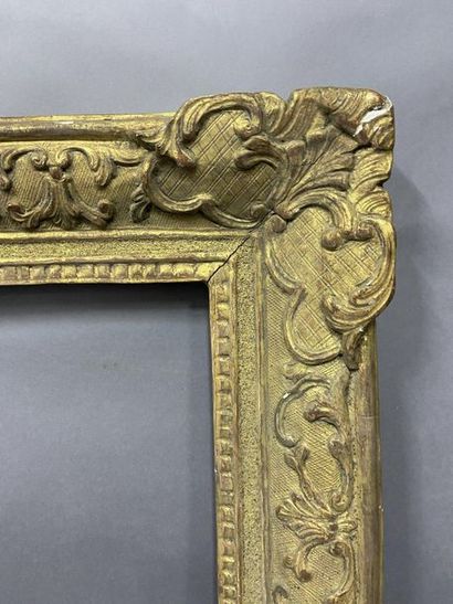 null Carved and gilded oak frame with Bérain decoration

Louis XIV period

39 x 55...