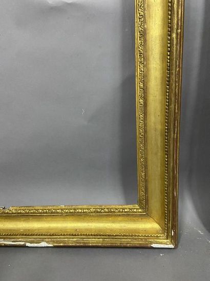 null Moulded gilded pine frame with pearl and heart raisin decoration

Italy, early...