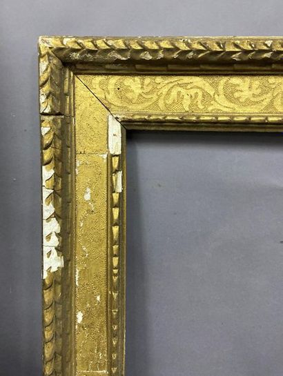 null Carved and gilded wood frame called ''à cassetta'' with bulinatto scrolls decoration.

Italy...