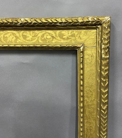 null Carved and gilded wood frame called ''à cassetta'' with bulinatto scrolls decoration.

Italy...