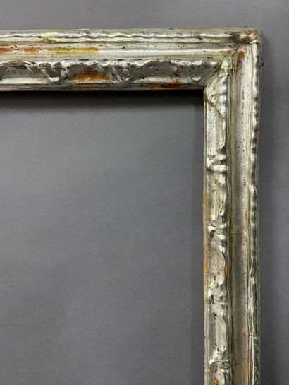 null Carved and silver plated wooden frame with reversed profile 

Northern Italy,...