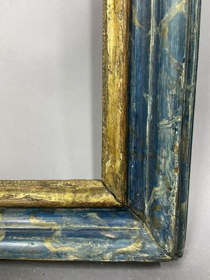 null Cadre en bois mouluré, feuillure doré et repatiné faux marbre bleu, 

Italie,...