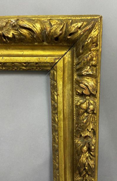 null Sculpted and gilded lindenwood frame with a frieze of laurel leaves 

Louis...