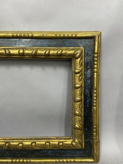 null Carved and gilded lindenwood frame with blue upside down profile, 

 Spain,...