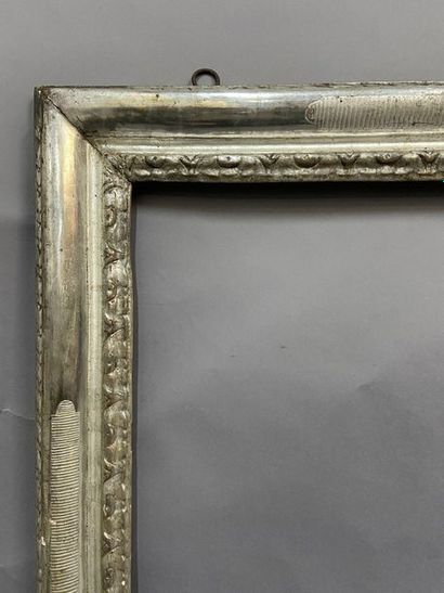 null Sculpted and silvery lindenwood frame with scraper decoration

 Italy XVII-XVIIIth...