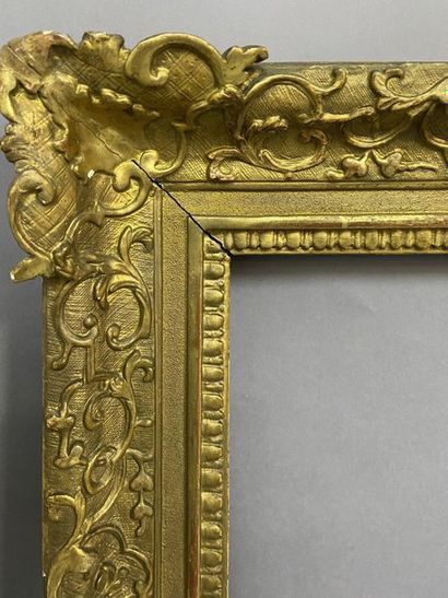 null Oak frame, carved and gilded, with Bérain decoration

Louis XIV period

86 x...
