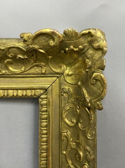 null Oak frame, carved and gilded, with Bérain decoration

Louis XIV period

86 x...
