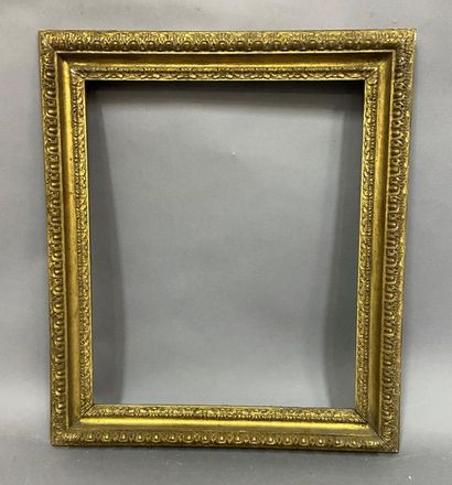 null Carved and gilded lindenwood frame with water leaves and gadroons, called Carlo...