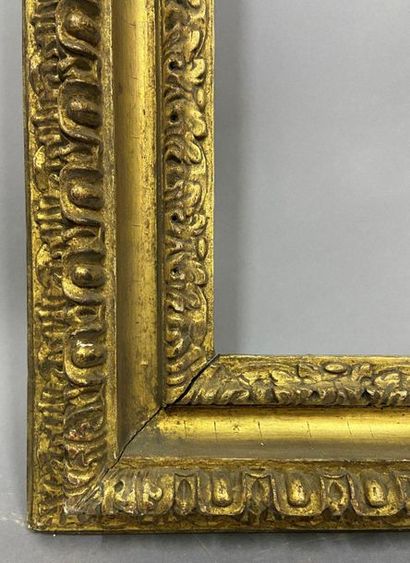 null Carved and gilded lindenwood frame with water leaves and gadroons, called Carlo...