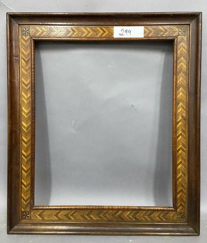 null Wooden frame, veneer of various species with a geometrical frieze decoration

France,...