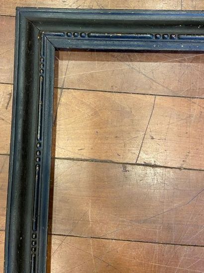 null Wooden frame, carved and blackened with upside down profile 

The Netherlands...