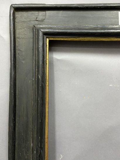 null Blackened and moulded wood frame and gold rabbetted frame called ''à cassetta''....