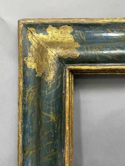null Wooden frame with gilded moulding and blue upside-down profile

Italy, 17th...