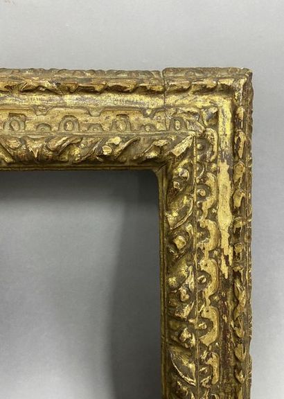 null Sculpted and formerly gilded fir wood frame with an upside-down profile 

Spain,...