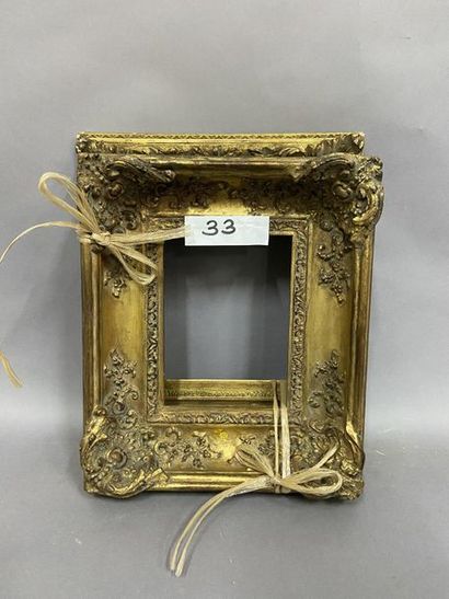 A set of two gilded wood and stucco frames...