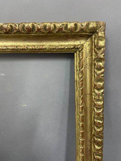 null Carved and gilded wooden frame with gadroon frieze decoration 

Provence or...
