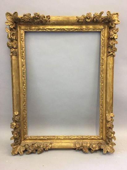 null * Carved and gilded oak frame with floral corners.

Late Louis XIII- early Louis...