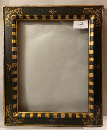 null *Black and gold molded linden frame, called ''à cassetta'' with scrolls ''a...