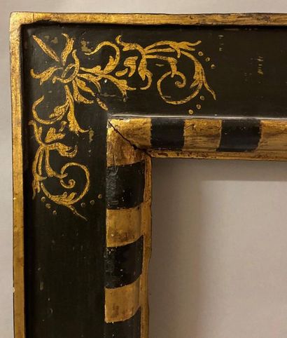 null *Black and gold molded linden frame, called ''à cassetta'' with scrolls ''a...