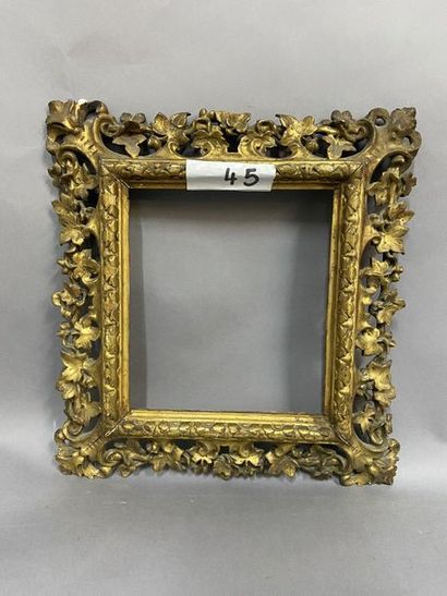 Sculpted and gilded lindenwood frame with...