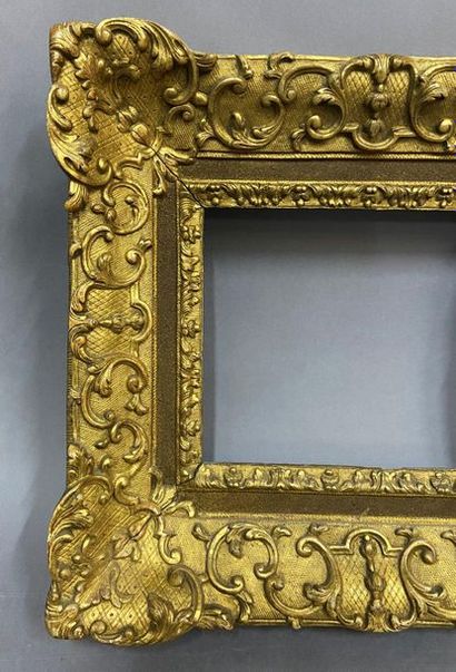 null Sculpted and gilded oak frame with beautiful Bérain decoration

Louis XIV period

15.5...