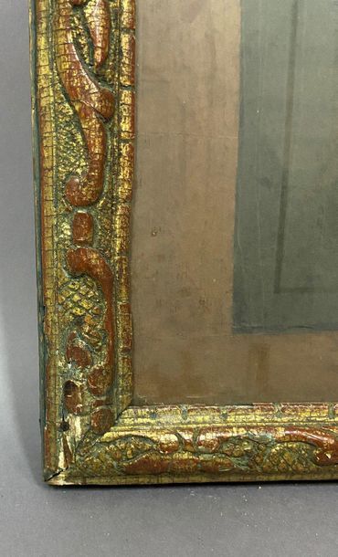 null Baguette en bois sculpté et doré à décor Bérain

Epoque Louis XIV

52 x 42 x...