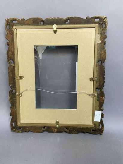 null Sculpted and gilded lindenwood frame with openwork baroque decoration

Italy,...