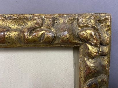 null Baguette en bois sculpté et doré à profil renversé à décor de frise d'acanthes

Style...