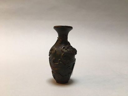 null Chine et Japon

Ensemble comprenant: Une petite coupe libatoire en bois sculpté...