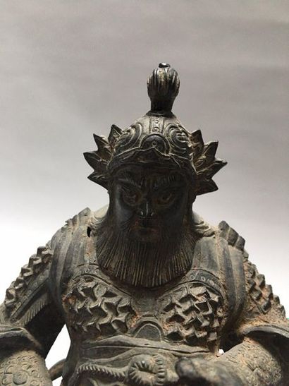 null CHINE

Statuette de gardien céleste en bronze à patine brune et traces de dorure,...