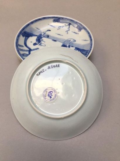 null CHINE
Suite de vingt soucoupes circulaires en porcelaine décorées en bleu sous...