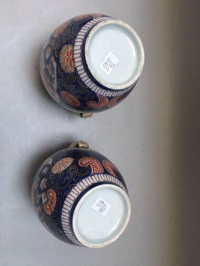 null Dans le style Imari du Japon

Paire de vase balustre en porcelaine à décor de...