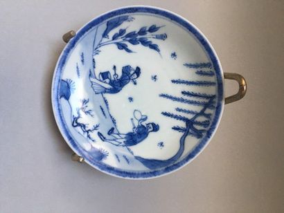 null CHINE
Suite de vingt soucoupes circulaires en porcelaine décorées en bleu sous...