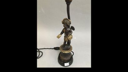 null Lamp stand representing a cherub delivering a bronze letter. Marble base. Bears...