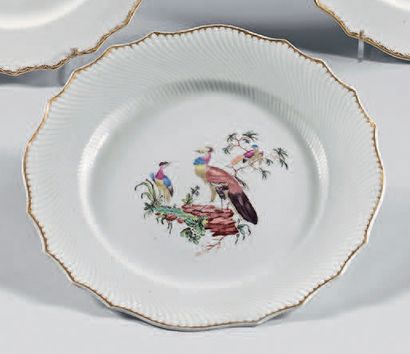 null Plate in Tournai porcelain of the end of the 18th century (3rd period). Gold...