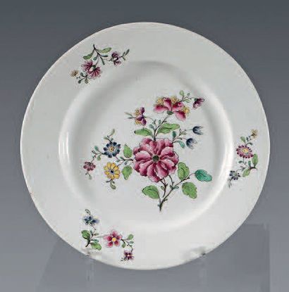 null Plate in porcelain of Tournai of the 18th century (1st period). Mark in hollow....
