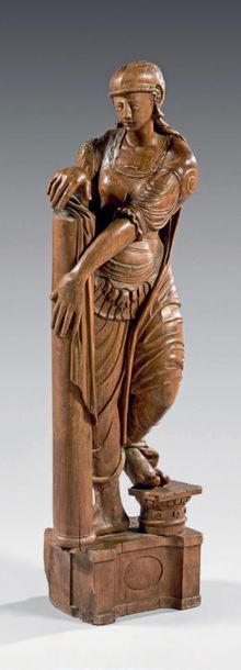 null Moulded walnut statue sculpted in the round representing an allegory in the...